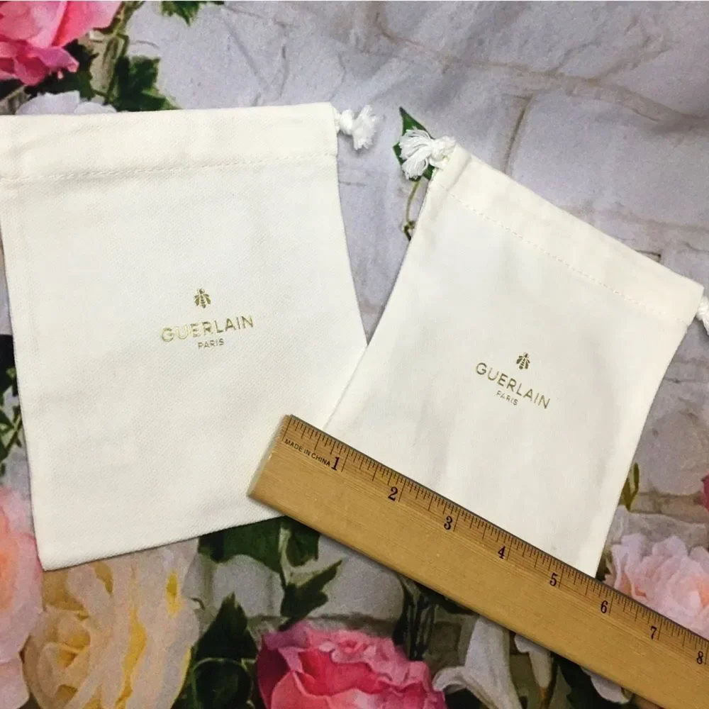 TWO (2) Guerlain mini small white drawstring dustbag new approx 5” x 5”